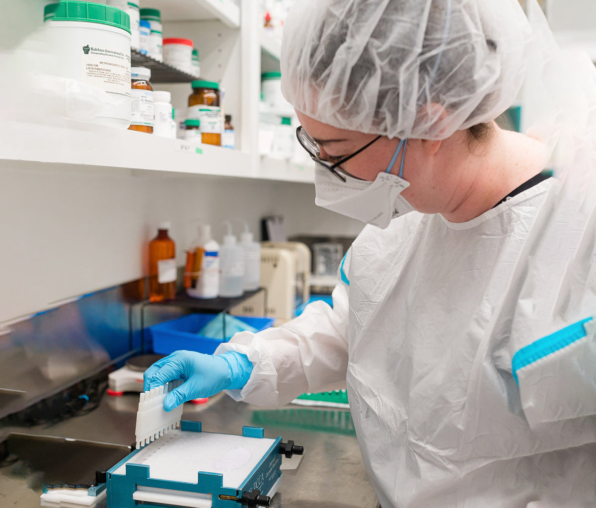 Licensed pharmacist compounding a personalized medication at Thornhill's Pharmacy