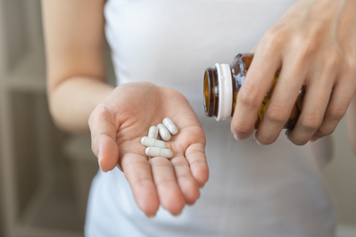 woman taking supplements